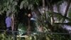 Authorities conduct a search after an explosion near the Israeli Embassy in New Delhi on Dec. 26, 2023.