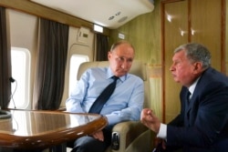 Путін та Сєчин