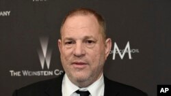 FILE - Harvey Weinstein arrives at The Weinstein Company and Netflix Golden Globes afterparty in Beverly Hills, California, Jan. 8, 2017.