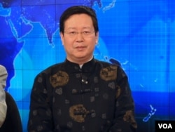 旅美經濟學者夏業良