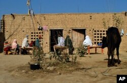 One of the victims was 4-year-old Asma. She was raped and killed, her body abandoned in a field near her home in Mardan. In this image taken on Jan. 19, 2018, villagers visited her house.