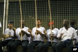 Pausa num treino de Capoeira Angola