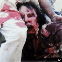 "Kadhafi morreu como uma ratazana" (c/ fotos)