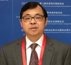 人口學家、美國威斯康辛大學麥迪遜分校資深科學家易富賢博士。 (照片由本人提供)
