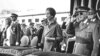 FILE - Former Spanish dictator General Francisco Franco salutes beside his wife Carmen Polo, the then Prince Juan Carlos of Spain and his wife Princess Sofia as they listen to the national anthem during a ceremony at El Pardo Palace, Oct. 4, 1975.