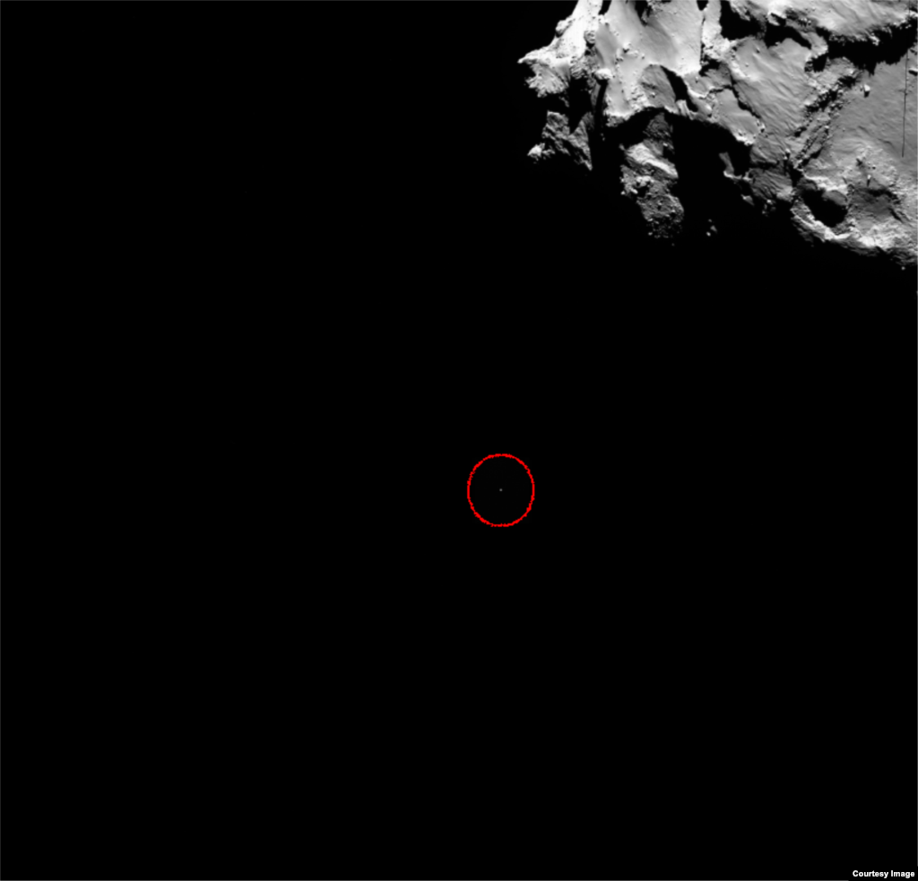 Cette image de la caméra grand-angle OSIRIS montre la position de l'atterrisseur de Rosetta Philae (encerclée) le 12 novembre 2014. (Courtoisie: Agence spatiale européenne, photo diffusée le 13 novembre 2014)