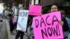 Demonstrators urging the Democratic Party to protect the Deferred Action for Childhood Arrivals Act (DACA) rally outside the office of California Democratic Sen. Dianne Feinstein in Los Angeles, Jan. 3, 2018. 