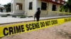 FILE - Police crime scene tape is seen in Owo, Ondo, Nigeria, June 6, 2022.