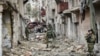 This undated handout photo released, Jan. 2, 2017, by the Russian Defense Ministry claims to show Russian military engineers operating in Aleppo, Syria.