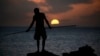 An Aboriginee is seen spear fishing in Australia's Northern Territory in this July 18, 2013, file photo.