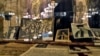 Old pictures showing the daily life of the Romanian Jewish community are on display at the main synagogue in Bucharest, Romania, Jan. 27, 2017, during a commemoration service for those killed 75 years ago.