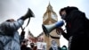 Pro-Palestinian protesters chant slogans in front of Elizabeth Tower, commonly known by the name of the clock's bell, "Big Ben," at the Palace of Westminster, home to parliament, in central London on Jan. 6, 2024. They demanded a cease-fire in the Israel-Hamas war.