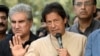 FILE - Pakistani opposition leader Imran Khan talks to the media outside his house in Islamabad, Pakistan, November 1, 2016. Speaking Friday on future Pakistan-Afghanistan relations, Khan said he sees “open borders” and “free trade” between the two countries.