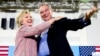 FILE - Democratic presidential candidate Hillary Clinton, accompanied by Sen. Tim Kaine, D-Va., speaks at a rally in Annandale, Va., July 14, 2016. Clinton has chosen Kaine to be her running mate in the 2016 presidential election.