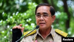 FILE - Thailand’s Prime Minister Prayuth Chan-ocha speaks at the Government House in Bangkok, Thailand, March 20, 2023.
