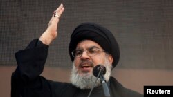 Le leader du Hezbollah, Hassan Nasrallah, s'adressant à ses partisans dans les faubourgs de Beyrouth, le 14 novembre 2013. REUTERS/Khalil Hassan(LEBANON - Tags: POLITICS RELIGION) - RTX15CVK 