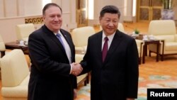 中国国家主席习近平在北京人大会堂会晤到访的美国国务卿蓬佩奥。 （2018年6月14日）