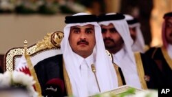 L'émir du Qatar Sheikh Tamim ben Hamad Al-Thani, sommet du Conseil de coopération du Golfe, Doha, Qatar, le 9 décembre 2014. 