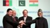 FILE - Turkmen President Gurbanguly Berdymukhamedov (L) shakes hands with Afghan President Ashraf Ghani (2nd-L), then-Pakistani Prime Minister Nawaz Sharif (2nd-R), and Indian Vice President Hamid Ansari during a ceremony in Ashgabat, Turkmenistan, Dec. 13, 2015. 