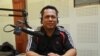 FILE - Kem Ley, a Cambodian analyst, discusses the meaning of color revolution and freedom of expression in Cambodia during Hello VOA call-in show in Phnom Penh, on Thursday, June 30, 2016. (Lim Sothy/VOA Khmer)