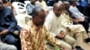 Djibrill Bassolé, Gilbert Diendéré et d'autres accusés lors de leur procès à Ouagadougou, le 27 avril 2017.