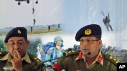 Brigadier General Muhammad Masud Razzaq (R) talks about what he said was a coup attempt by retired and serving officers late last month, which intelligence sources said was driven by a campaign to introduce Sharia law throughout the majority Muslim countr