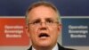 FILE - Australian Immigration Minister Scott Morrison speaks during a press conference in Sydney.