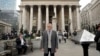In this photo taken Nov. 2, 2017, Hubertus Vaeth, the managing director of Frankfurt Main Finance poses for a portrait outside the Royal Exchange in the City of London. With London-based banks, insurers and asset managers all scrambling to prepare for Britain's exit from the European Union, Hubertus Vaeth is putting out Frankfurt's welcome mat for any financial service refugees who are looking for an EU base after Brexit in March 2019. 