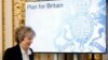Britain's Prime Minister Theresa May smiles as she arrives to deliver a speech on leaving the European Union at Lancaster House in London, Jan. 17, 2017. 