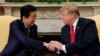 U.S. President Donald Trump meets with Japan's Prime Minister Shinzo Abe in the Oval Office at the White House in Washington, April 26, 2019. 