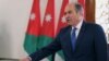 A handout picture released by the Jordanian Royal Palace on Sept. 28, 2016 shows Jordan's Prime Minister Hani Mulki taking a oath at the swearing-in ceremony of Jordan's new government in Amman. Jordan's King Abdullah II re-appointed Prime Minister Hani al-Malki on September 25,2016 to form a new government following elections in which the Muslim Brotherhood made its return as a parliamentary force. 