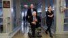 FILE - Sen. John McCain heads to the Senate floor ahead of votes on Capitol Hill in Washington, U.S., Dec. 6, 2017. 