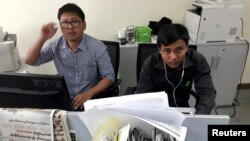 路透社記者瓦龍（左）與覺梭資料照（路透社）