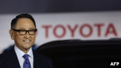 FILE - Toyota president Akio Toyoda looks on at a briefing at the company’s showroom in Tokyo on Dec. 14, 2021. Russia banned Toyoda and 12 other Japanese business executives from entering the country. 
