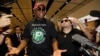 Former NBA basketball player Dennis Rodman arrives at Singapore's Changi Airport, June 12, 2018.