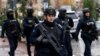 Kosovo Police officers patrol in the streets of Mitrovica, which is ethnically split between Serbs in the north and Albanians in the south, on November 30, 2024, as Kosovo stepped up security measures around critical infrastructure.