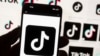 FILE - The TikTok logo is seen on a cell phone on Oct. 14, 2022, in Boston. 
