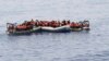 This undated image made available on May 30, 2016 by the Italian Navy Marina Militare shows migrants being rescued at sea. Survivor accounts have pushed to more than 700 the number of migrants feared dead in Mediterranean Sea shipwrecks over three days in the past week, even as rescue ships saved thousands of others in daring operations. 