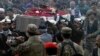 People attend the funeral of a Pakistani soldier in Lahore, Pakistan, Dec. 13, 2017. 
