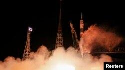 La capsule Soyouz au décollage de Baïkonour, au Kazakhstan (Reuters)