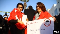 At a protest in Tunisia, activists are defiant, saying terrorism will not change their way of life, Tunis, March 19, 2015. (Mohamed Krit/VOA)
