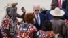 Rais wa Marekani Joe Biden akifurahia ngoma ya asili ya watu wa Angola baada ya kuwasili uwanja wa ndege wa Catumbela Angola, Dec. 4, 2024. 