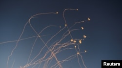 Interceptions of rockets launched from Lebanon to Israel over the border, amid ongoing cross-border hostilities between Hezbollah and Israeli forces, close the Israeli border with Lebanon, on its Israel side