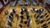 Voters wait in line in the gymnasium at Brunswick Junior High School to receive their ballots for the midterm election in Brunswick, Maine, Nov. 6, 2018. 
