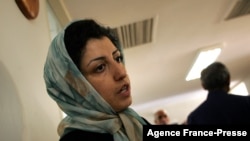 FILE - Iranian opposition rights activist Narges Mohammadi is seen at the Defenders of Human Rights Center in Tehran, Iran, June 25, 2007.