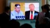 FILE - People watch a TV screen showing file footage of U.S. President Donald Trump, right, and North Korean leader Kim Jong Un during a news program at the Seoul Railway Station in Seoul, South Korea, April 21, 2018.