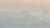 This photo taken on Dec. 25, 2023 shows buildings amid high levels of air pollution in Yinchuan, in China’s northern Ningxia region.