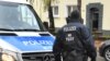 Policemen search an apartment building close to the mosque "Deutschsprachiger Islamkreis Hildesheim e.V." (German speaking Islam circle, DIK) in Hildesheim, central Germany, Nov. 8, 2016.