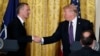 President Donald Trump (R) shakes hands with NATO Secretary General Jens Stoltenberg during a news conference in the East Room of the White House, April 12, 2017, in Washington. 
