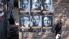 Posters of French presidential election candidates as part of a campaign of "Solidarite Sida" in Paris, France, April 19, 2017.